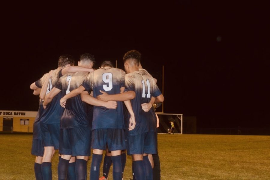 The players celebrate after a victory. 