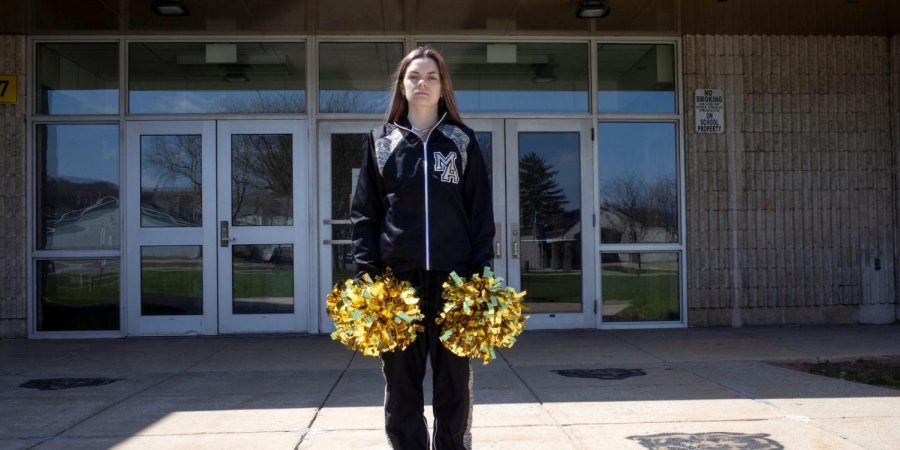 Brandi Levy standing in front of her school, Mahanoy Area High School.