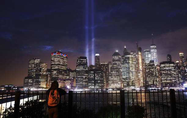 NEW+YORK%2C+NY+-+SEPTEMBER+11%3A++The+Tribute+in+Light+memorial+lights+up+lower+Manhattan+near+One+World+Trade+Center+on+September+11%2C+2018+in+New+York+City.+The+tribute+at+the+site+of+the+World+Trade+Center+towers+has+been+an+annual+event+in+New+York+since+March+11%2C+2002.+Throughout+the+country+services+are+being+held+to+remember+the+2%2C977+people+who+were+killed+in+New+York%2C+the+Pentagon+and+rural+Pennsylvania+in+the+terrorist+attacks+on+September+11%2C+2001.++%28Photo+by+Spencer+Platt%2FGetty+Images%29