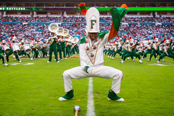 MIAMI+GARDENS%2C+FL+-+SEPTEMBER+05%3A+A+drum+Major+of+the+Marching+100+performs+during+their+dance+routine+at+the+Orange+Blossom+Classic+game+between+the+Florida+A%26amp%3BM+Rattlers+and+the+Jackson+State+Tigers+on+Sunday+September+5th%2C+2021+at+Hard+Rock+Stadium+in+Miami+Gardens%2C+FL.++%28Photo+by+Nick+Tre.+Smith%2FIcon+Sportswire+via+Getty+Images%29