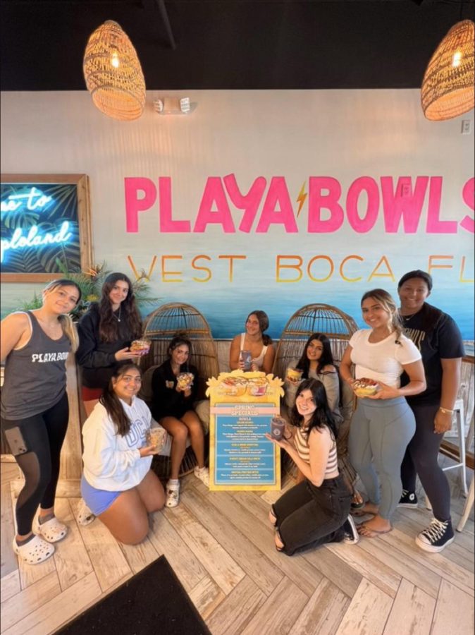 Olivia Eberhardt and her coworkers at Playa Bowls West Boca