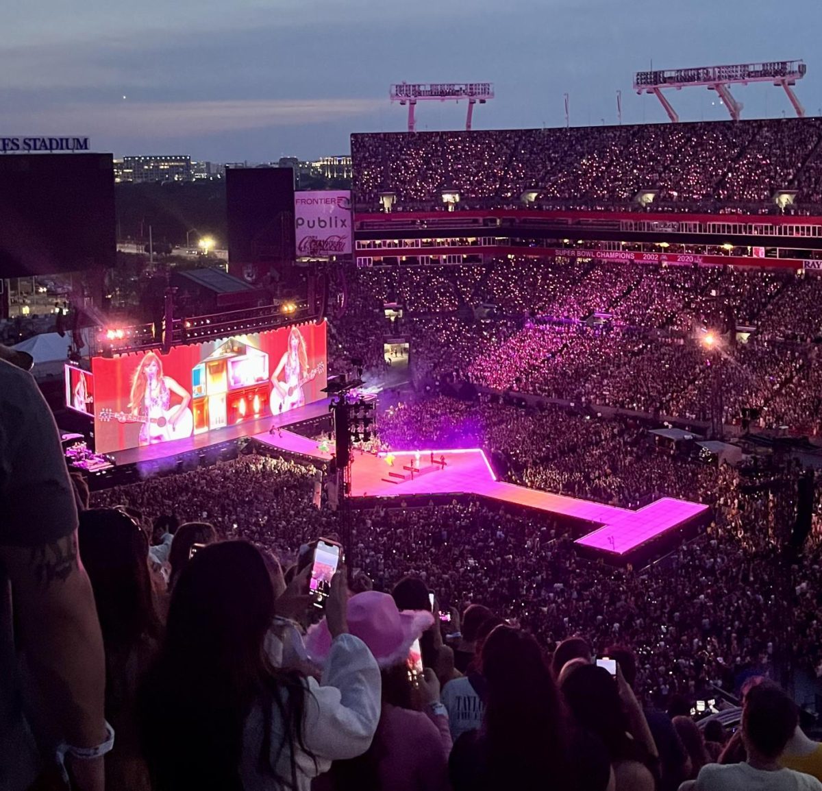 Taylor Swift performing on April 15th at the Raymond James Stadium to a sold-out stadium.