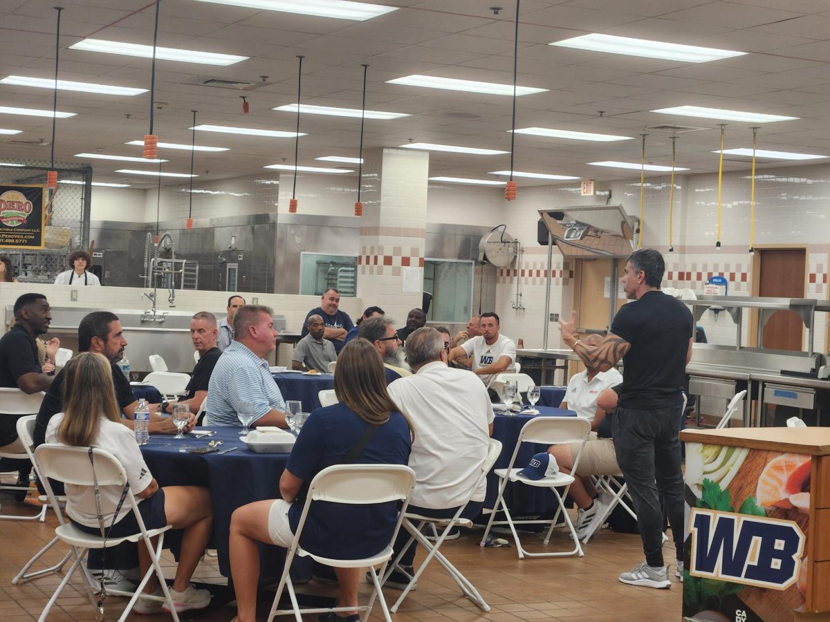 Principal Capitano giving a speech at the end of dinner.