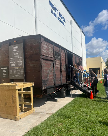 Image of replica cattle car used during the Holocaust at West Boca High