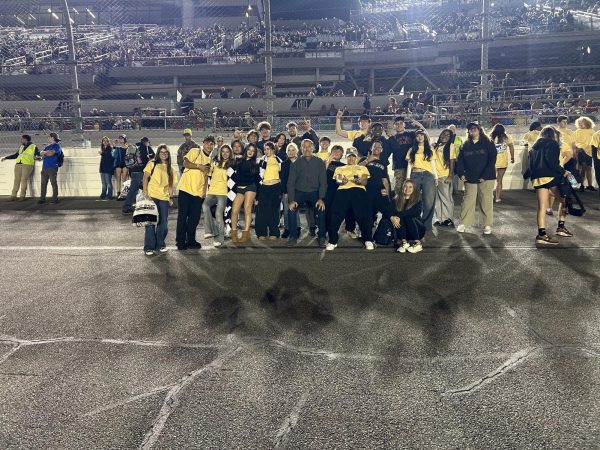 The DECA students on the Daytona race track
